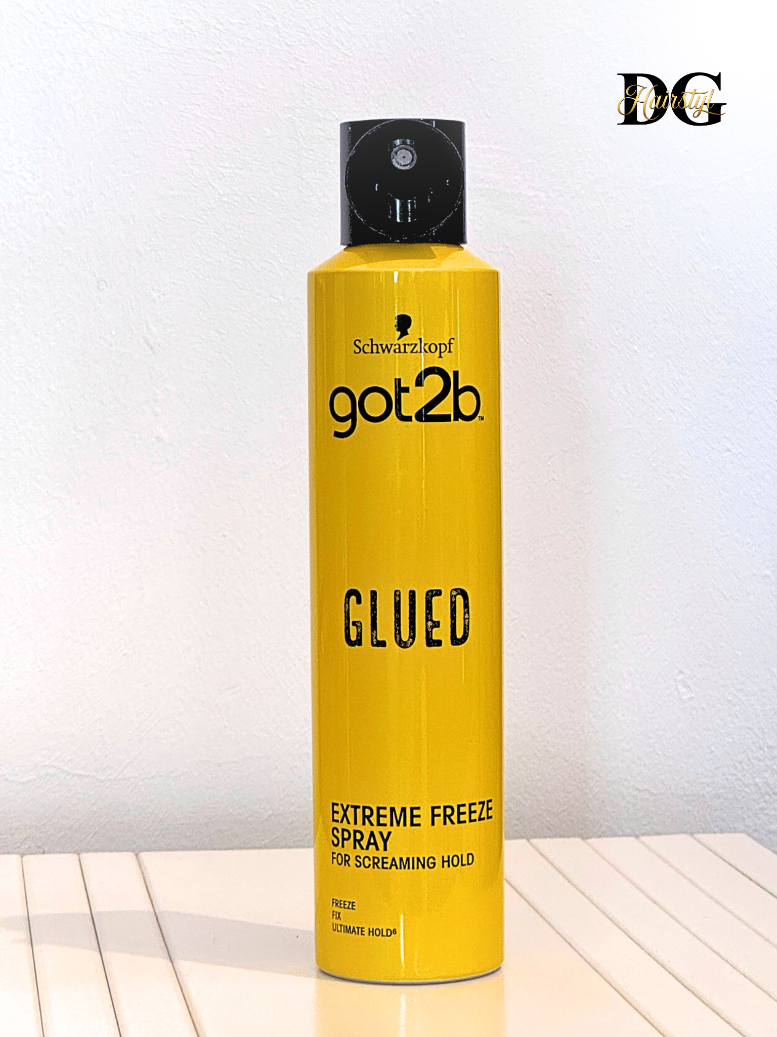 Alt-tekst (NL): Got2b Glued Freeze Spray – sterke haarspray voor het fixeren van lace wigs, babyhairs en edges. Populair in België voor langdurige hold zonder residu. Spray fixant Got2b Glued – tenue ultra forte pour perruques lace, baby hairs et coiffures afro. Très utilisé en Belgique pour un maintien longue durée sans résidu.